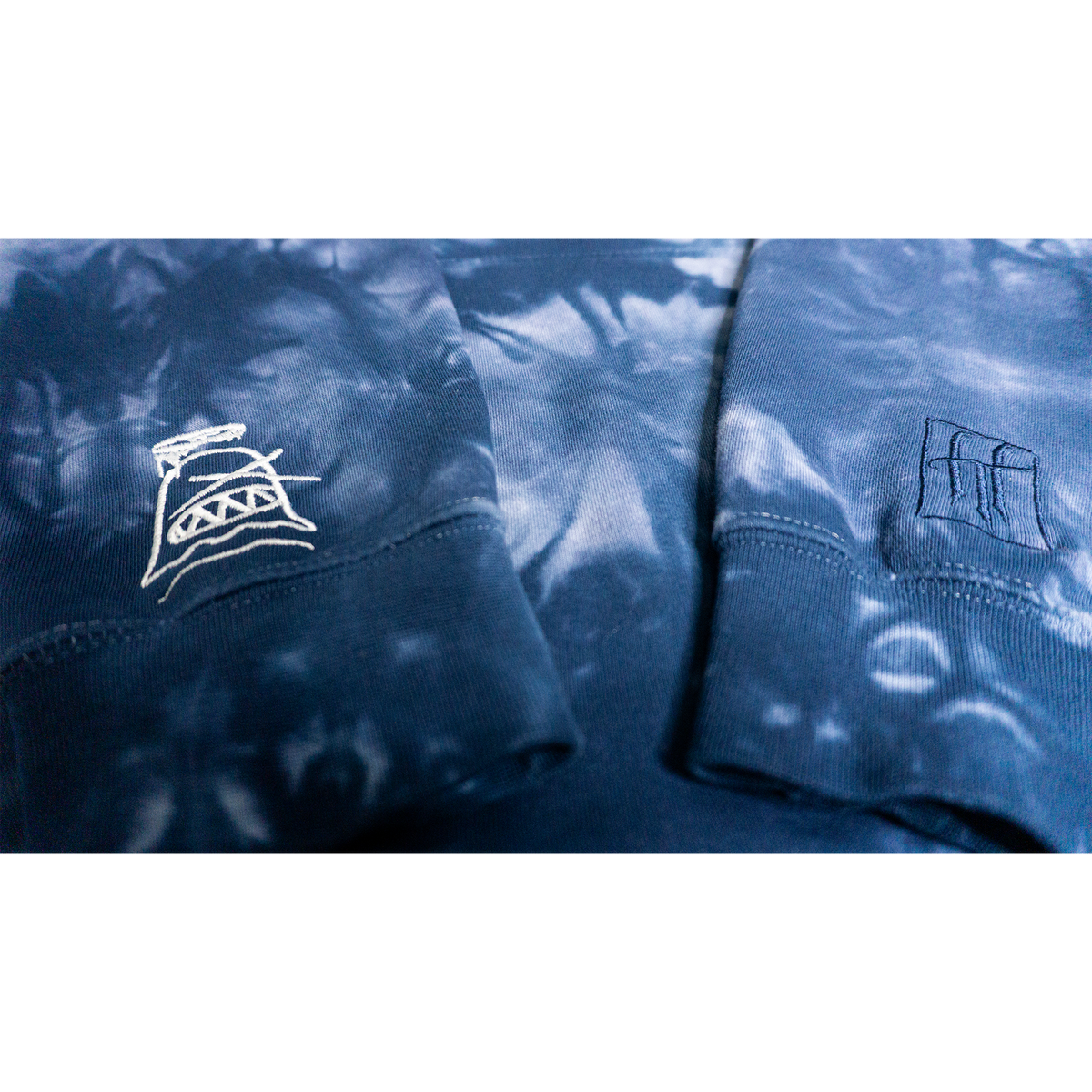 Pray For Your Enemies (More Blessings) Hoodie (Navy Tie-Dye) — sleeve view